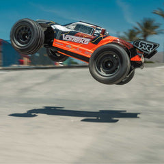 1/10 VORTEKS MEGA 550 Brushed 2WD Stadium Truck RTR with Battery & Charger, Oran