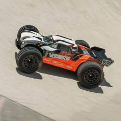 1/10 VORTEKS MEGA 550 Brushed 2WD Stadium Truck RTR with Battery & Charger, Oran