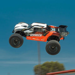 1/10 VORTEKS MEGA 550 Brushed 2WD Stadium Truck RTR with Battery & Charger, Oran