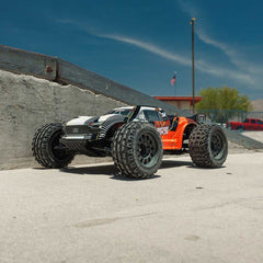 1/10 VORTEKS MEGA 550 Brushed 2WD Stadium Truck RTR with Battery & Charger, Oran