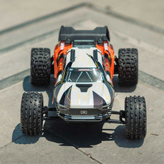 1/10 VORTEKS MEGA 550 Brushed 2WD Stadium Truck RTR with Battery & Charger, Oran