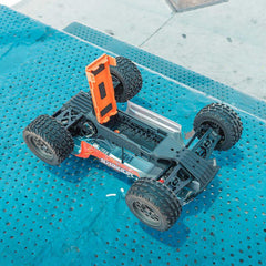 1/10 VORTEKS MEGA 550 Brushed 2WD Stadium Truck RTR with Battery & Charger, Oran