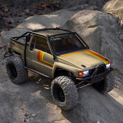 1/10 SCX10 III 1987 Toyota SR5 4X4 RTR Brushed Rock Crawler TAN by Axial