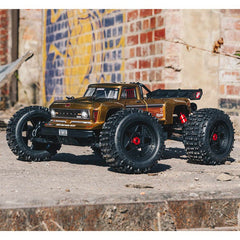 OUTCAST 4X4 4S BLX 1/10 Stunt Truck Bronze (Battery & Charger COMBO)