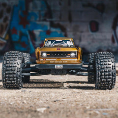 OUTCAST 4X4 4S BLX 1/10 Stunt Truck Bronze (Battery & Charger COMBO)
